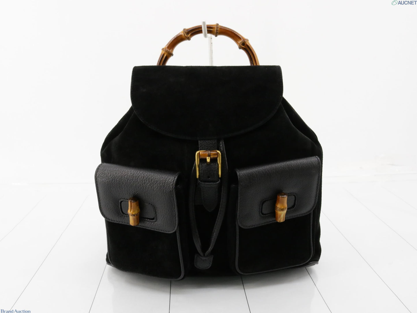 Gucci black suede backpack with bamboo handle and gold hardware