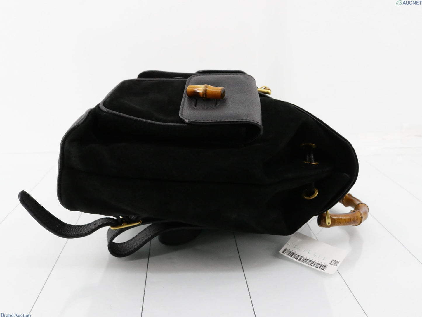 Gucci black suede backpack with bamboo handle and gold hardware
