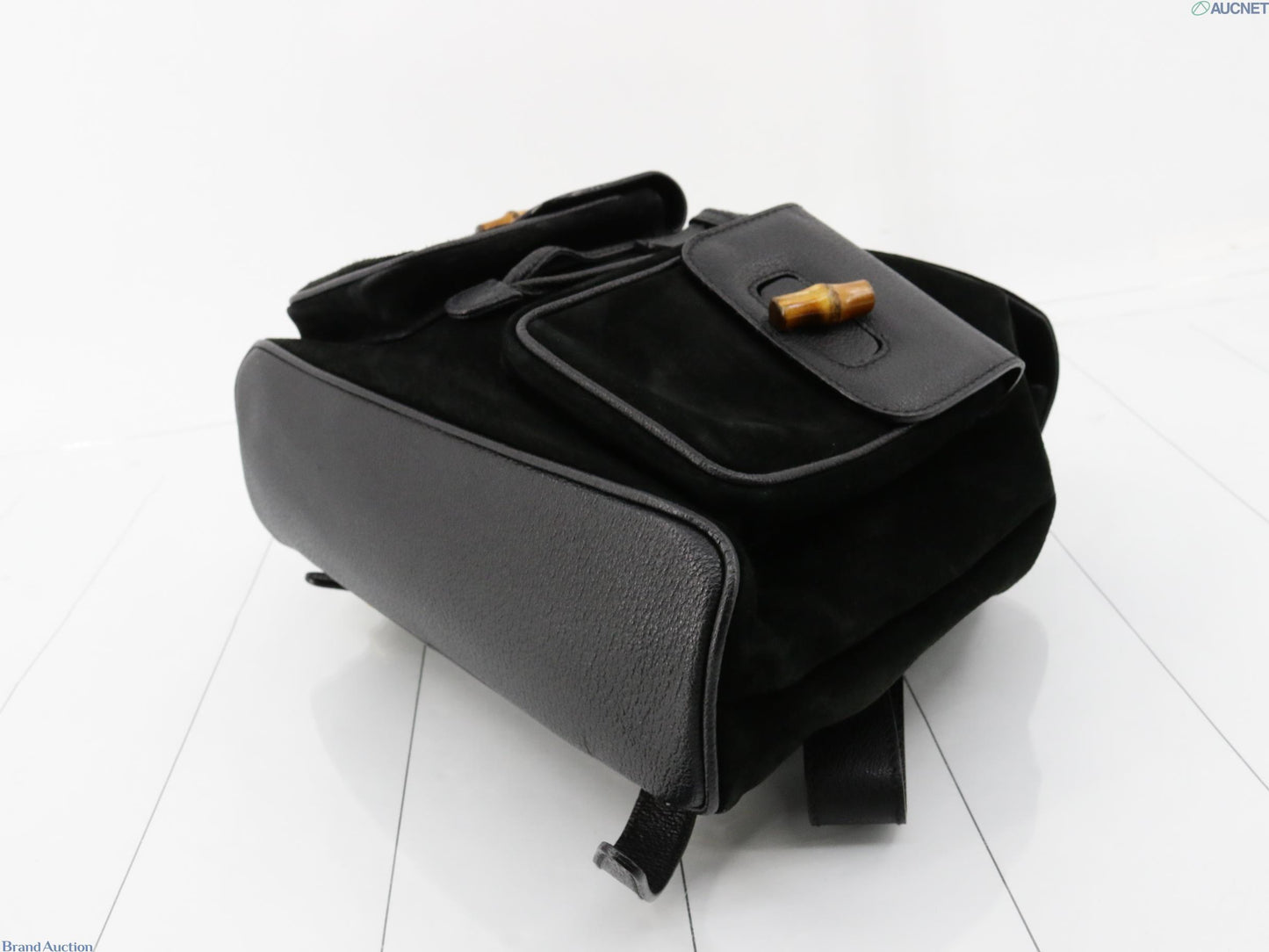 Gucci black suede backpack with bamboo handle and gold hardware