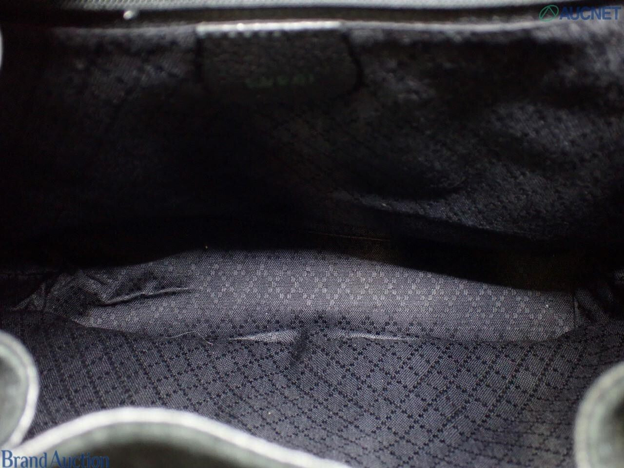 Gucci black suede backpack with bamboo handle and gold hardware